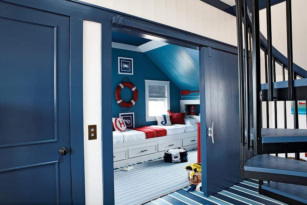 kids room with bright blue barn door